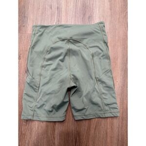 Athleta Ultimate Stash Pocket 7 Inch Shorts Olive Green Womens Size M Athletic